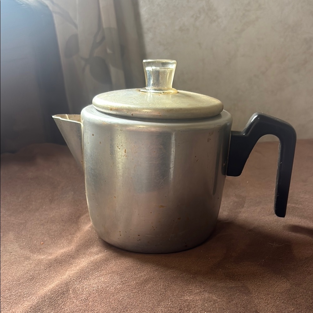 Sleek Silver and Black Kitchen Tool Teapot